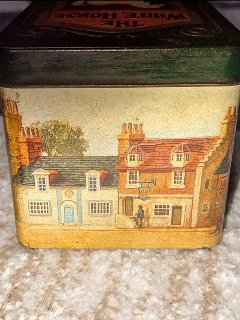 Vintage white horse Scottish whiskey tin. Good condition.